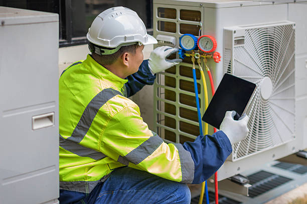 Professional Ductwork Repair technician working in Spencer, MA